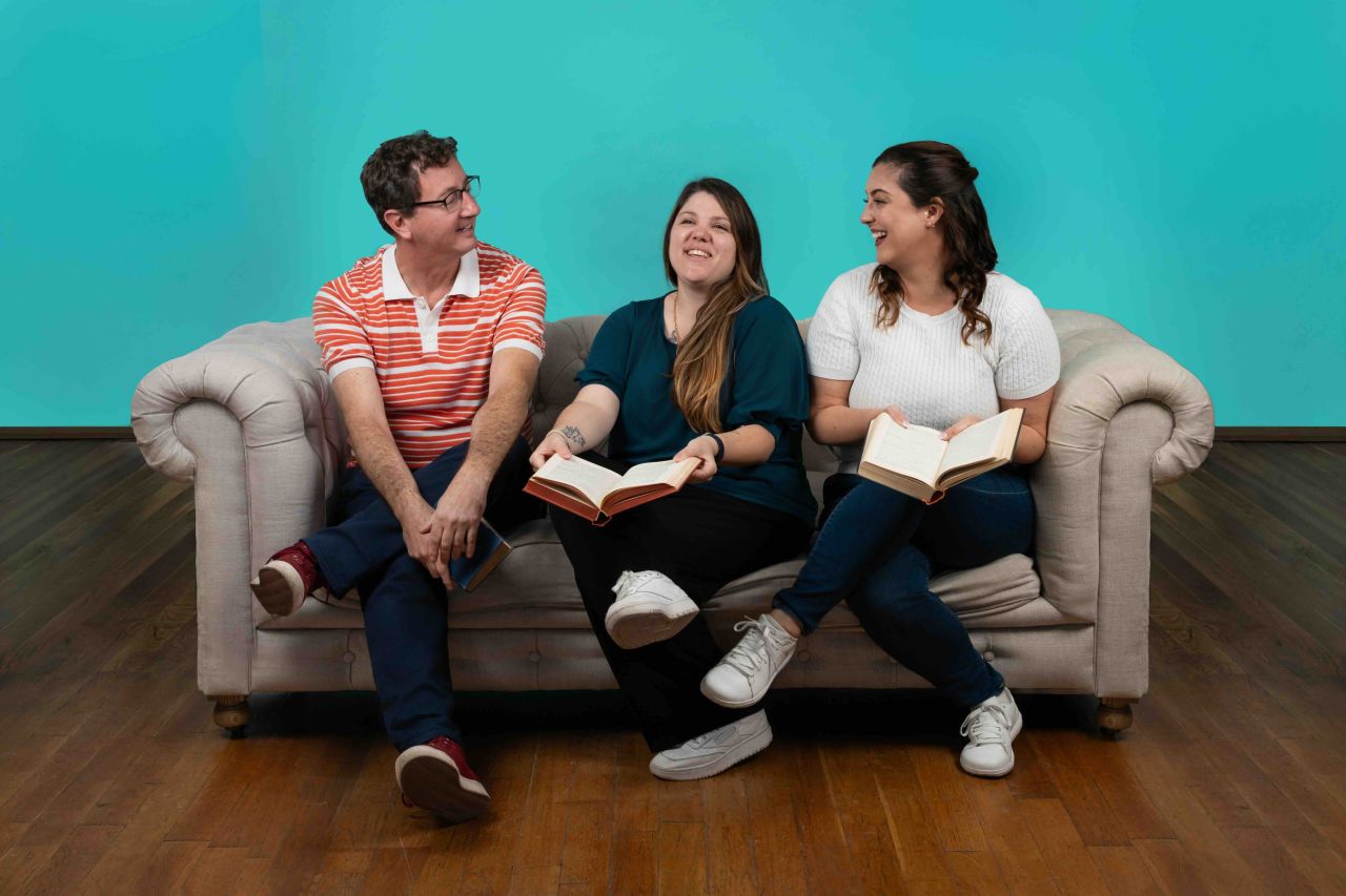 Inflectiv six-year anniversary Three people sharing a conversation on a sofa, pictured in Inflectiv’s sixth-anniversary post.
